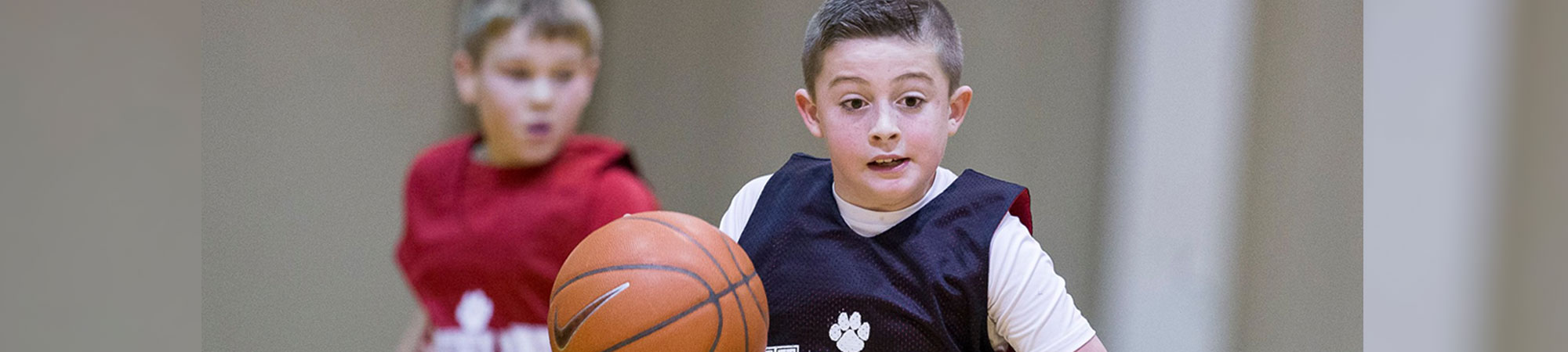 young boys playing basketball